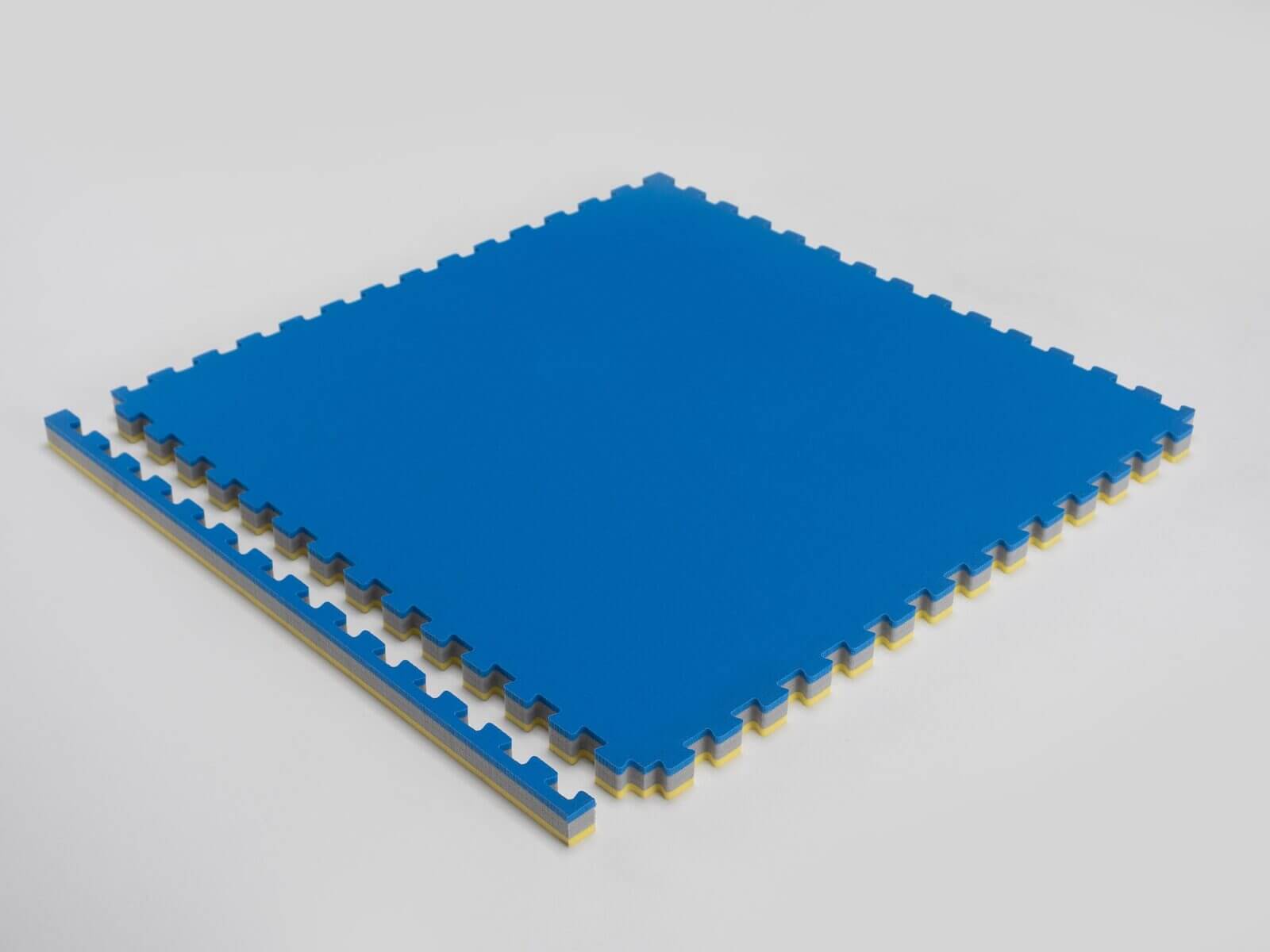 Tatami ProGame MULTI PERFORMANCE 12 tatami-progetto-puzzle multiperformance-reversibile-blu-giallo-4-cm-bordato